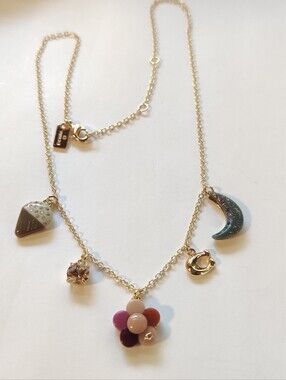 Coach Gold-Tone Multi Charm Necklace with Pink Flower and Blue Moon